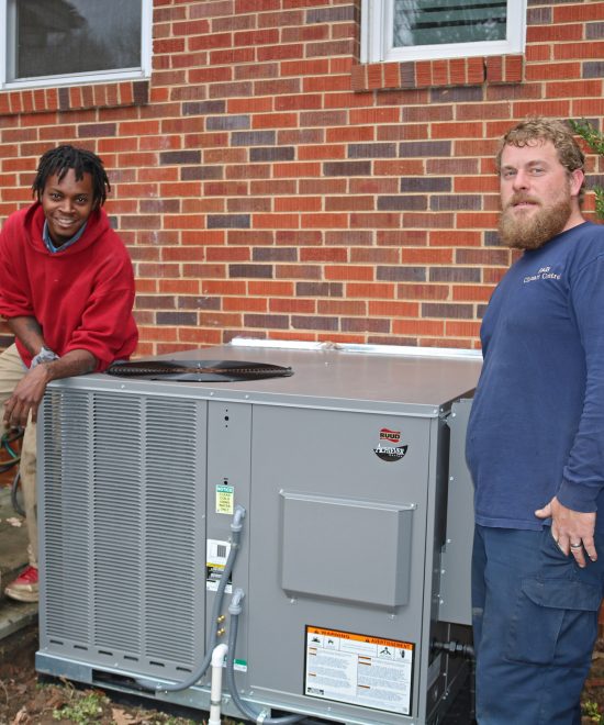 R & B Climate Control team & Staff working on a unit