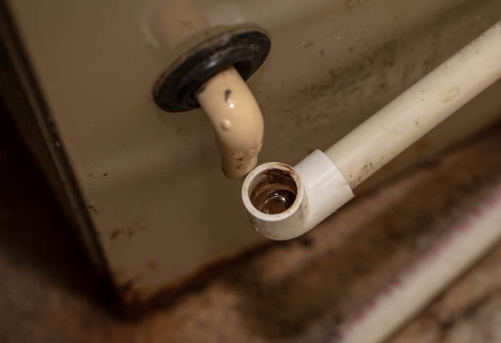 Fix a clogged condensation drain line